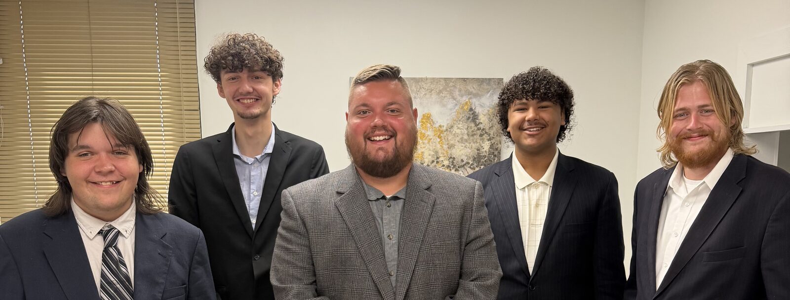 The Atlas Marketing Inc. sales team together in the Des Moines office